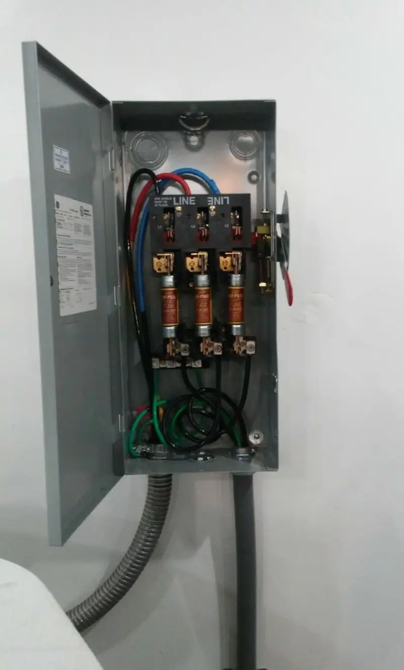 Three-phase disconnect switch installed for Smoke Detector Installation in Tangerine